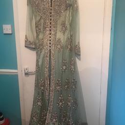 Long heavy asian dress for special occasions.Worn only once in pristine condition. Size 40