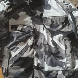 Worn a couple of times, perfect condition XLARGE