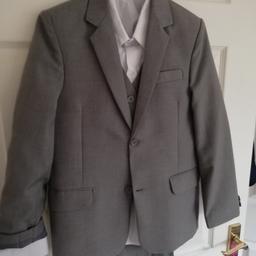 Boys 4 piece grey suit worn once excellent condition includes trousers , waist coat, jacket and white shirt £15
