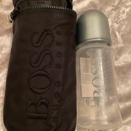 Hugo boss bottle and cover brand new with tags bought from harrods. Both for £14