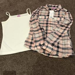 Girls F&F two part shirt set. Still with label on so excellent condition. Cream vest top and light pink, cream and back checked shirt. Age 9/10yrs.