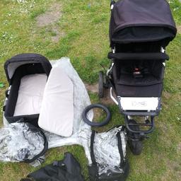 Mountain Buggy Urban Jungle, with toddler out facing seat, carry cot with two mattresses, car seat adaptor, rain cover for carry cot and toddler seat. Spare wheel inner tube and cup holder.

The buggy is well used, has scratches and signs of use, one of the back wheels needs a new tyre as it has split at the seam, and the large rain cover has a torn slightly at the fabric seam, this is repairable.i I did not replace as my little one has out grown the buggy.

The price does reflect the condition