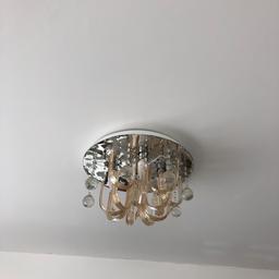 Crystal ceiling light with usb flash and changing colour also has Bluetooth to connect you phone or tv I have only 3 left its perfect for living room dinning or bedroom £50 each or 3 for £130