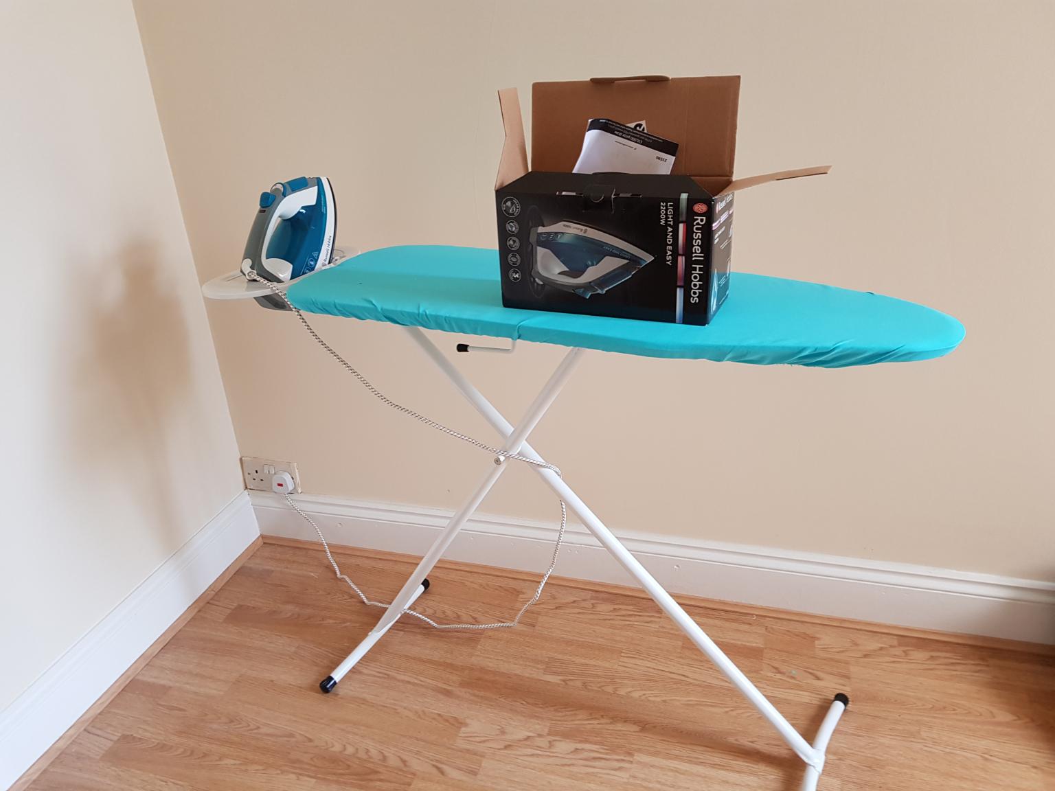 Russell Hobbs iron and ironing board in E13 London Borough of Newham