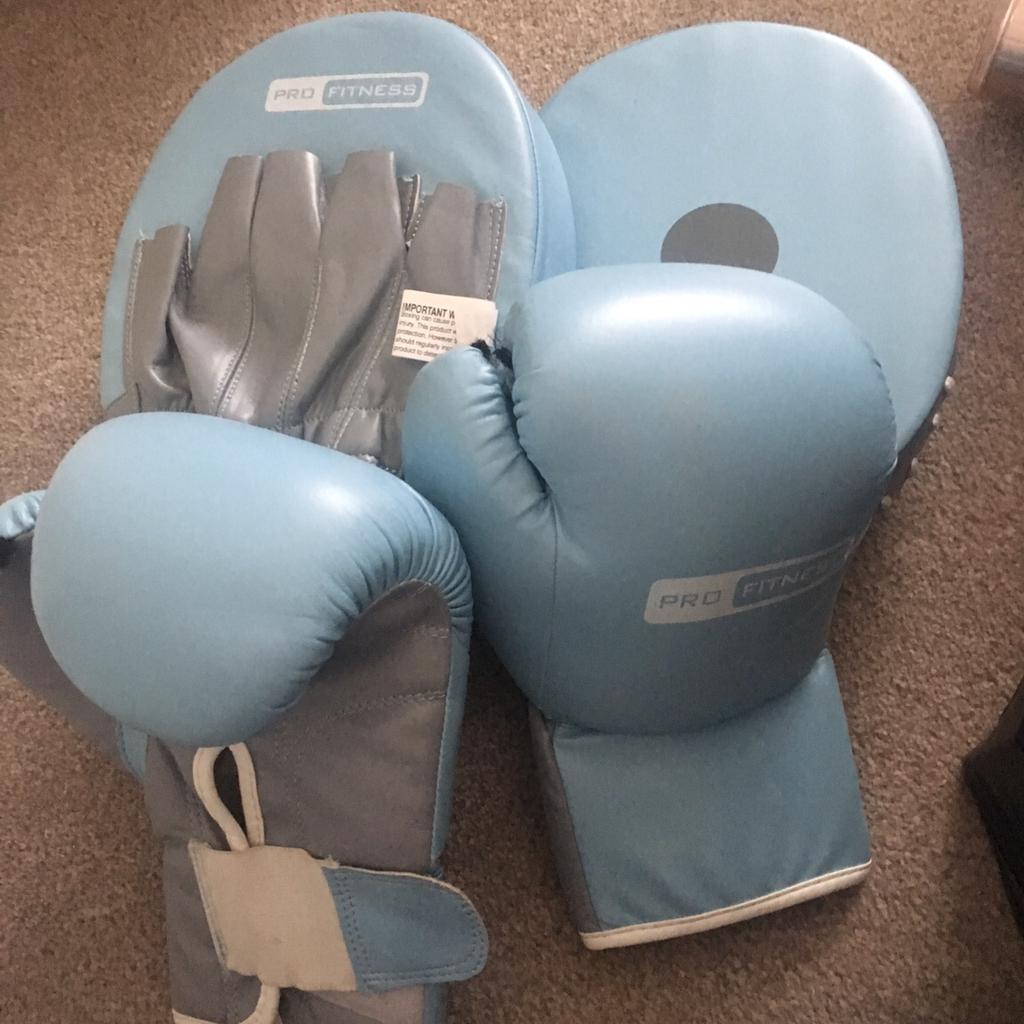 Boxing gloves and pads. Barely used