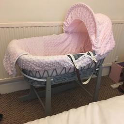 Stunning pink Moses basket and stand, never been used. All washed and ready to go! Comes with 1 extra pink sheet. 30 Ono as I need the space now.