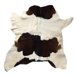 Real cow calf hide rug, cow calf hair on leather rug, it’s new , natural & shiny hair, it’s fully chemical tanned rug, no chemical smell, 27*25 inches. We can post as well