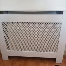 Free standing and includes brackets to connect to wall. smart radiator cover for snt room. size is 81.5cm (32 inches) height, 19cm (7.5 inches) wide and 112co (40 inches) long. Collection only.
