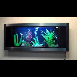 Wall mount fish tank never used
90 cm long
45 cm wide
Depth is 12 cm
Paid £280
