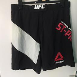 Reebok UFC MMA GSP OCTAGON SHORTS. 34” New With Tags. Condition is New with tags.