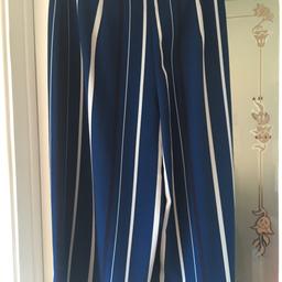 Blue stripe Zara polyester clotts in good condition. Suitable for work and leisure. Size: Medium.