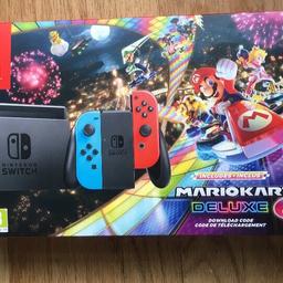 This Nintendo Switch was opened on Christmas Day 2018 & was played a handful of time til it went back in its box 30th of January. It comes with mario kart 8 built in & crash bandicoot trilogy, mario kart decal pack & extra joy con holders/ straps. It is in perfect condition never used hand held to play & there are no marks or scratches at all plus had a screen protector on the first day. Thank you for looking :) can be either picked up or date arranged to be dropped off for a small fee.
