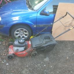 petrol lawnmower spares or repairs doesn't run maybe an easy fix for someone