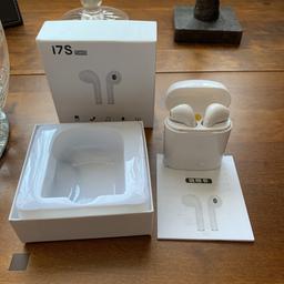 White or black Bluetooth earphones and charging case brand new suitable for either apple or android.