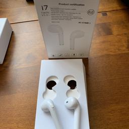 White Bluetooth earphones compatible with apple and android comes without charging case