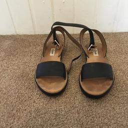 These are pair of black Clarks sandals in good condition. Selling as they are to small. 
U.K. Size 5