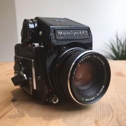 MAMIYA 645 1000S + Sekor C 80mm f2.8 with a prism viewfinder. It shoots 6cmx4.5cm negatives on medium format film. Because of this, you can get 16 exposures on one roll of 120 film.

The original M645 appeared in 1975. It has knob advance and shutter speeds from 8s to 1/500. The M645 1000S (1976) adds the 1/1000 top speed, a selftimer, a depth of field preview button and other details. It supports a mirror lockup and double exposure lever. Flash sync is 1/60 sec.

Happy to post it or travel ✌🏼