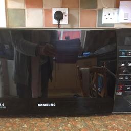 Little used microwave oven by Samsung, in new condition  been used by elderly gentleman to warm his porridge and milk drinks. Cellophane still like new round menu chart. 19” long, 12.5” deep, 11” high