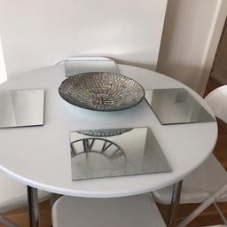 Lovely table and chairs 45in in diameter and 30in high collect Brentford