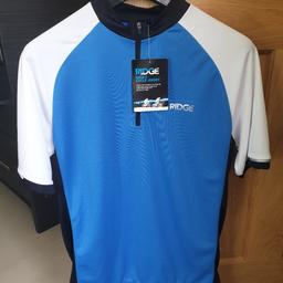 Ridge Biking Top in blue with white short sleeves...size M...brand new with tags....these retail at £50...