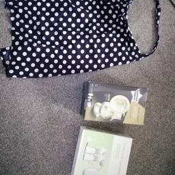 1x manual and 1x electric breast pump, both fully working and in good condition, comes with cover up apron for when out and about price is for all 3 items 