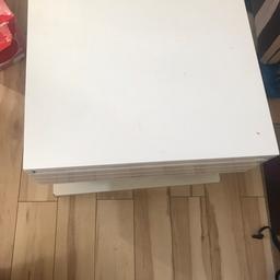 I have a white gloss coffee table which extends from all corners as u can see in the picture it has a tiny cigarette mark and a little crack at the bottom otherwise the table is in great condition with the usual wear and tear mainly around the bottom as pictured