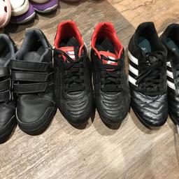Black Adidas trainer 5 1/2 good condition
Black red football boots metal studs sz 6 - good condition
Black white football/ rugby boots nylon studs sz 8 - great Condition

In my experience football boots always come up small