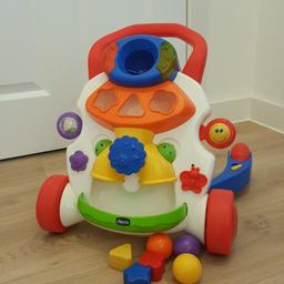 - Two toys in one, a baby walker and an activity centre
- Music stops when your baby stops walking, which encourages your baby to take a few more steps
-Features lights and sounds, which are activated as the correct shapes are inserted in the corresponding holes
- Requires 2 x AA 1.5 V batteries
- Suitable from 9 months and above