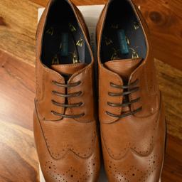 these brown shoes have never been worn 
in ex condition

no box 

size 12 men