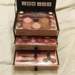 cost £30 Will sell for £20 - includes  10 eyeshadows - 5 blusher- mascara- liquid liner- 4 solid lip glosses - 2 highlighter powder - concealer wax- 4 lipsticks - eyeliner - and 5 accessories