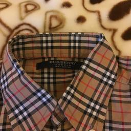 Hi am selling Burberry shirts size9/10 old boys