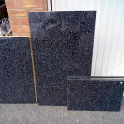 3 pieces of MDF kitchen worktop, black with silver and white flex. Largest piece measures approx length 107cm X depth 60cm. New, excellent condition. Collection from Warwick CV34