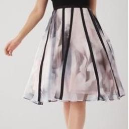 RRP £169 Flattering dress, blush skirt with tulle petticoat and a printed organza overlay. The top is stretchy so comfortable. Only only once last year, the whole outfit is so lightweight.