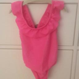 Bright pink frill neck swimsuit. pick up Liverpool or can pay for postage.