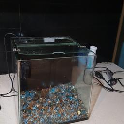 Tank is in great condition, holds 28 litres, gravel, heater and some food included.