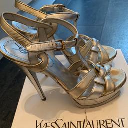 YSL tribute in silver and Gold size Uk 5, not original box. Signs of wear hence the low price as they cost over £700, seen on many celebs.smoke and pet free home