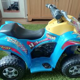 kids battery powered quad and charger
