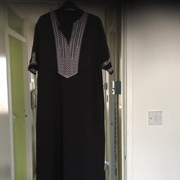 Brand new black and white kaften it has got pockets both sides size 14 long in length and really nice on just too small for myself