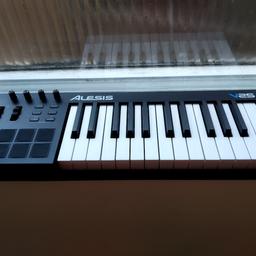 Great condition, everything works and has a sustain pedal input. Selling due to an upgrade.

The Alesis V25 is a powerful, intuitive MIDI controller that lets you take command of your music software with a series of pads, knobs, and buttons. With 25 full-size velocity-sensitive keys and Octave Up/Down buttons, you can expand the keyboard to the full melodic range and play bass lines, chords, and melodies.