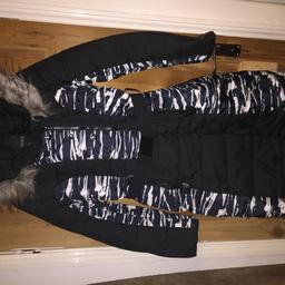 Medium warm coat black and white new open to nearest offer