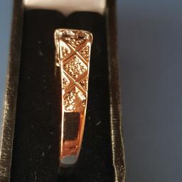 REAL VINTAGE 9cT 375 GOLD TINY DIAMOND SOLITAIRE ENGAGEMENT RING SIZE M . Condition is Used. Dispatched with Royal Mail 1st Class. 

Beautiful detailed ring like hammered effect 
Hallmarked a crown , 375, I think a lion'' face and letter D other Mark that's really tricky to see 

May need a clean/ polish