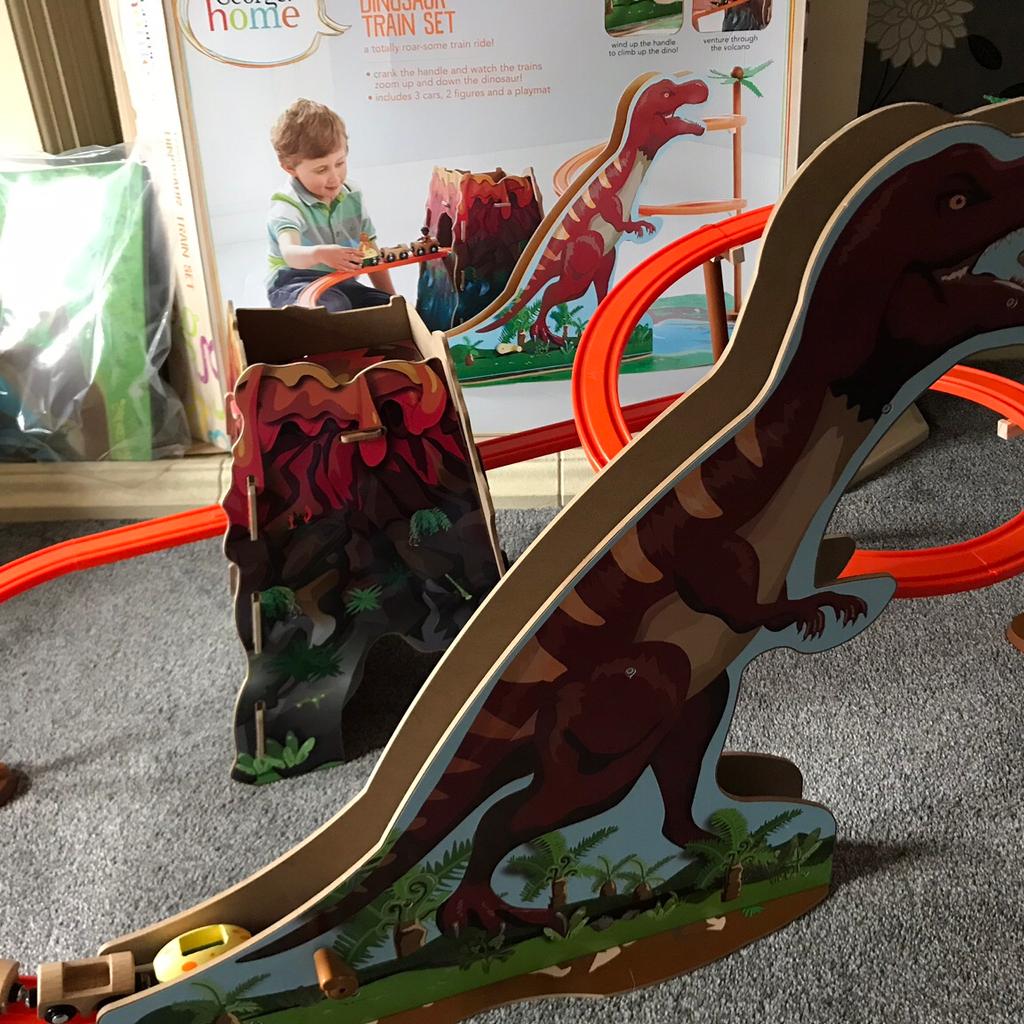 Wooden dinosaur best sale train set asda