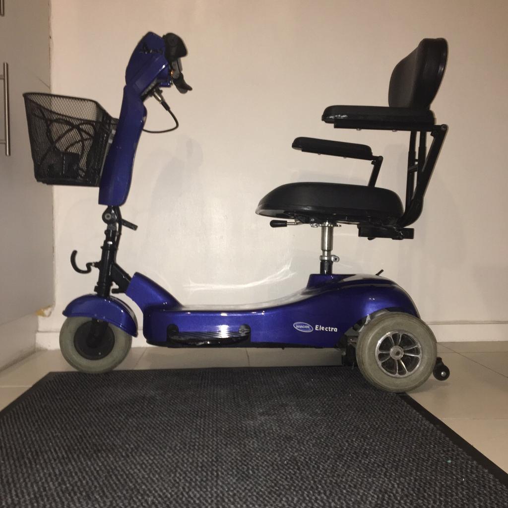 Invacare Electra 3 wheeler electric scooter 2003 model , pre owned, in very good condition, black and blue