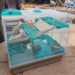 nice hamster cage in great condition only for sale due to upgrading my hamster to a bigger cage.