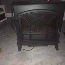 Large stove electric fire, good working order heats up very quick 4 heat settings just needs a bulb for the light. Pick up Oldham or local delivery is £5