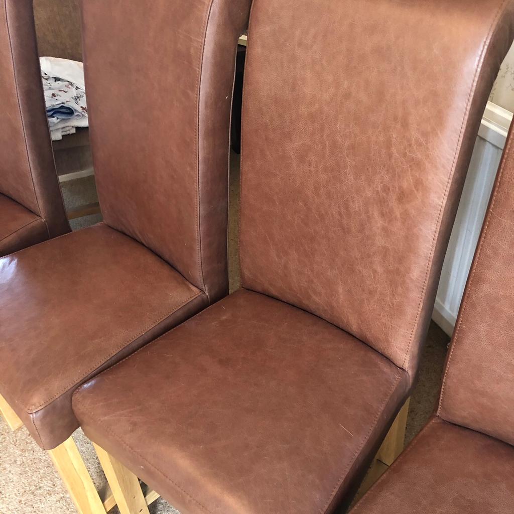 Set of Tan leather dining chairs in Peterborough für £ 80,00 zum