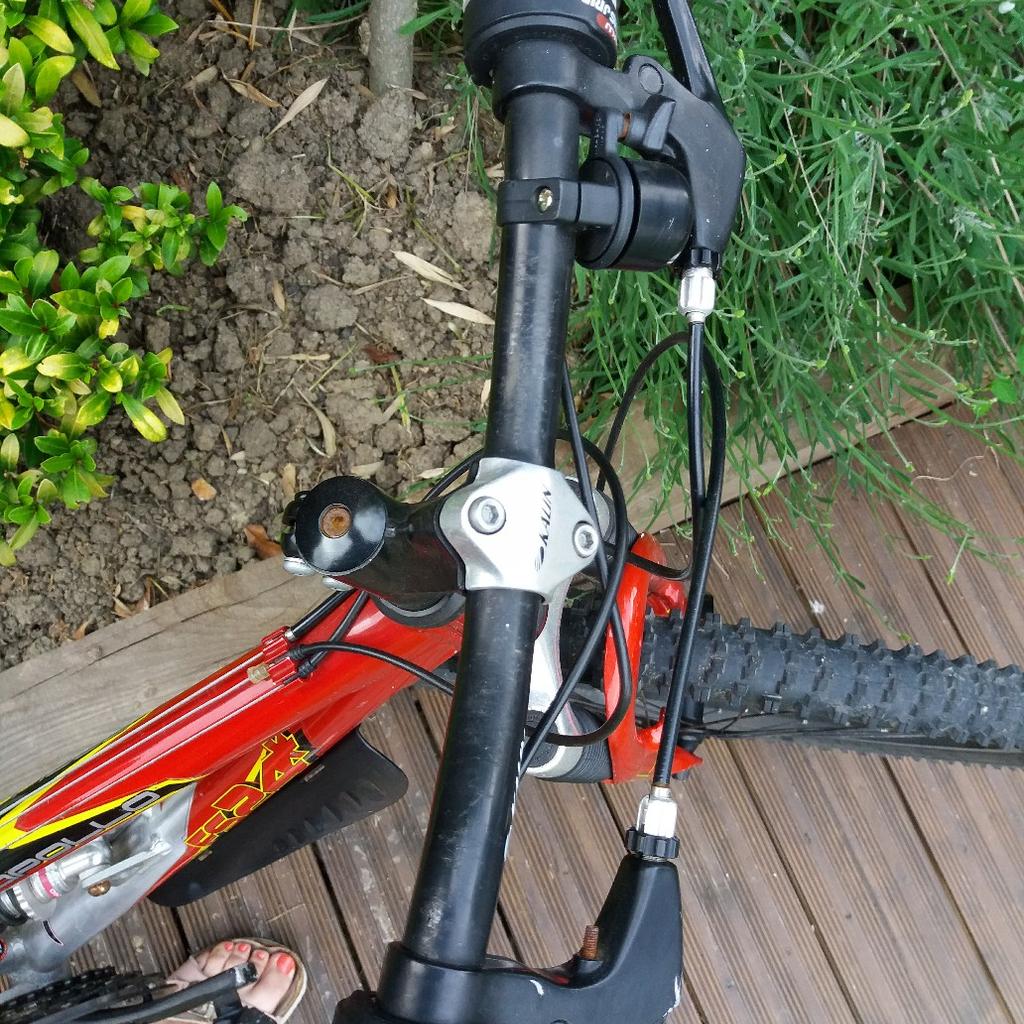 Apollo FS24 red and black mountain bike 24