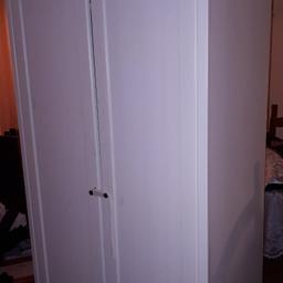 Tall white wardrobe for sale. no longer needed.