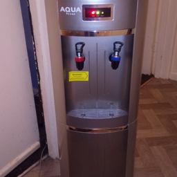 Very good water dispenser hot and cold, with cabinet under neath. Just needs water bottle