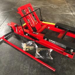 Brand new Clark motorcycle lift/jack, never used, capable of lifting 690kg to a height of 430mm Includes securing straps. I paid £142 for this lift from machine mart.